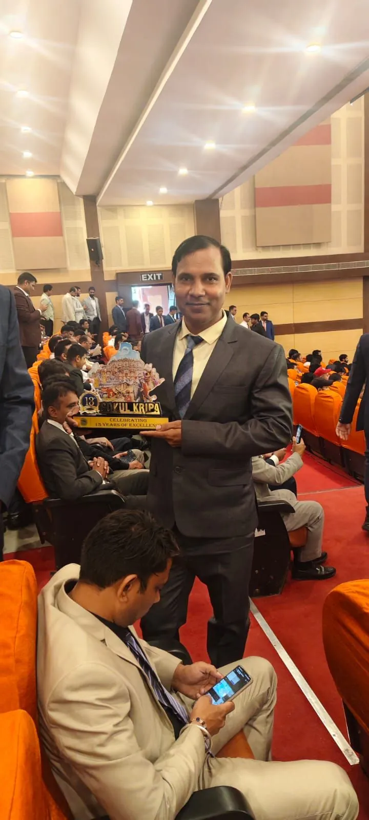 Proudly holding the Gokul Kripa 13-year excellence award