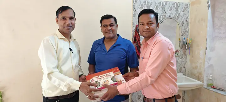 Customer receiving property handover with sweets